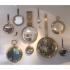 collection of mirrors, mid century brass